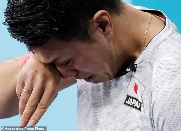 Отчаяние японца Цуйоши Ямагучи из-за проигрыша команде из Южной Кореи на соревнованиях по керлингу