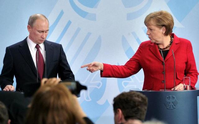 Путін та Меркель. Фото: Дзеркало тижня