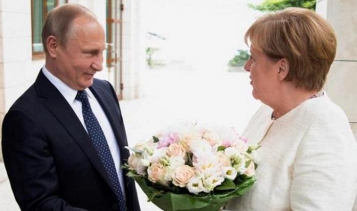 Путин и Меркель. Фото: EPA
