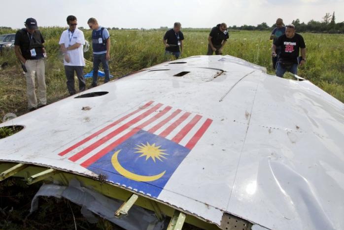 Последствия авиакатастрофы рейса MH17, фото: republika.co.id