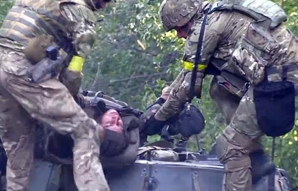 Под Иловайском обнаружили тела 26 украинских солдат. ФОТО