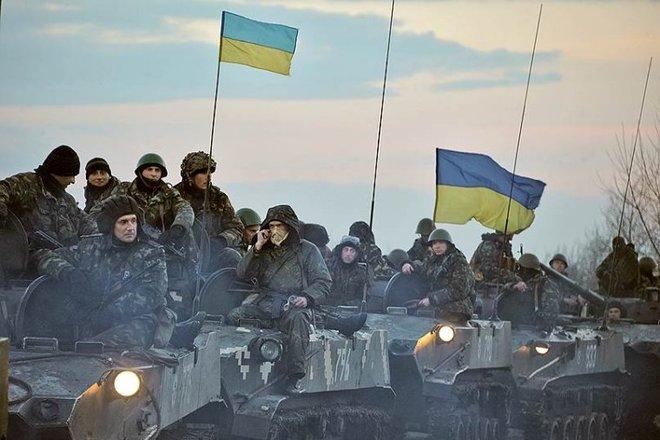 Україна почала відведення озброєнь — Лисенко