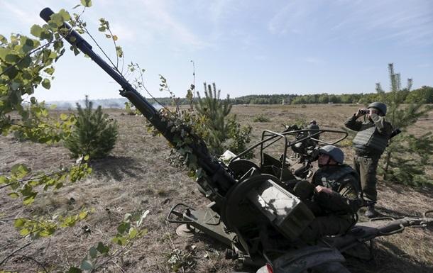 Бойцы АТО готовятся ко второй очереди отвода вооружений, несмотря на обстрел боевиков