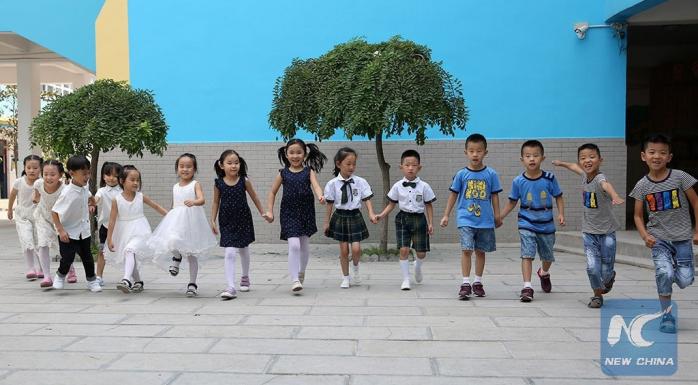 У Китаї сім пар близнюків навчатимуться в одному класі (ФОТО)
