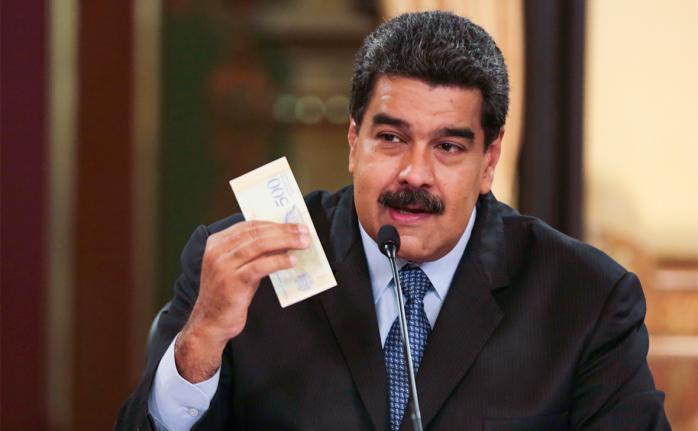 У Венесуелі випускають нові купюри, інфляція досягла 900%. Фото: РБК