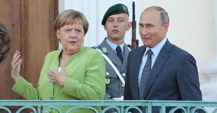 Путін та Меркель. Фото: 