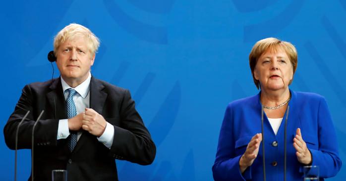 Меркель та Джонсон виступили проти повернення РФ до «Великої вісімки». Фото: kommersant.ru