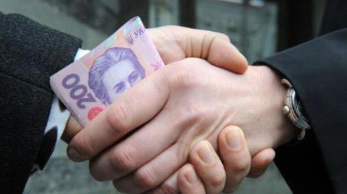На взятке в 60 тыс. грн в Киеве погорели чиновник Гоструда и адвокат. Фото: sud.ua