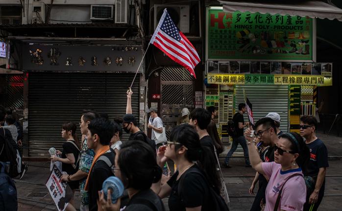 Китай ввел санкции против США за поддержку протестов в Гонконге, фото — РБК