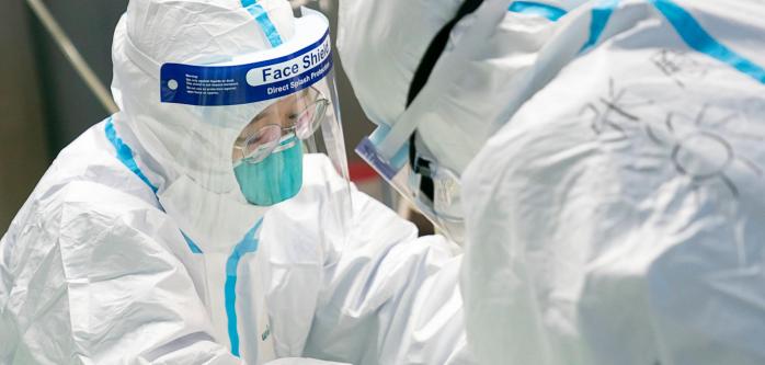 Коронавирус: в Китае закончились костюмы биозащиты, болезнь распространилась на новые страны, фото — Welt