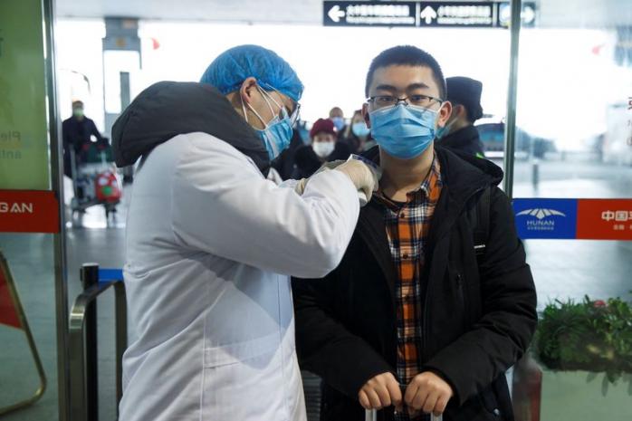 Китайським коронавірусом заразилося 64 тис. осіб. Фото: REUTERS/Thomas Peter
