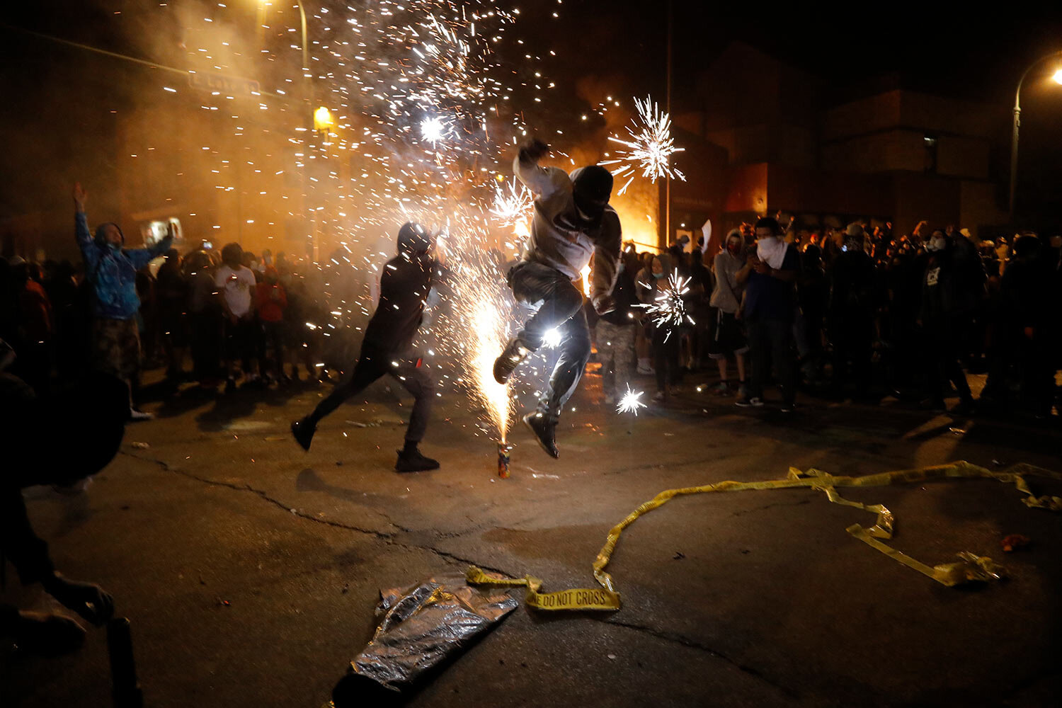 Протесты в США. Фото: AP Photo/John Minchillo