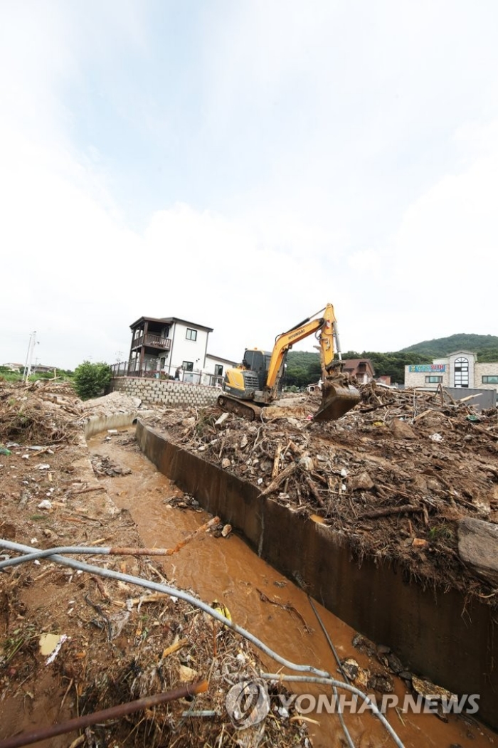 Южная Корея страдает от наводнений, фото: Yonhap