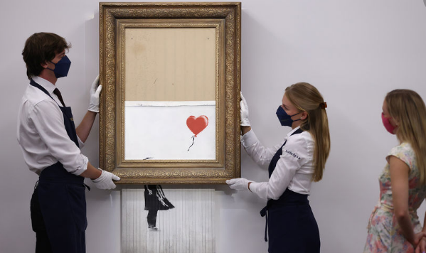 Изрезанную шредером картину Бэнкси продали за рекордные 25,4 млн долл. 