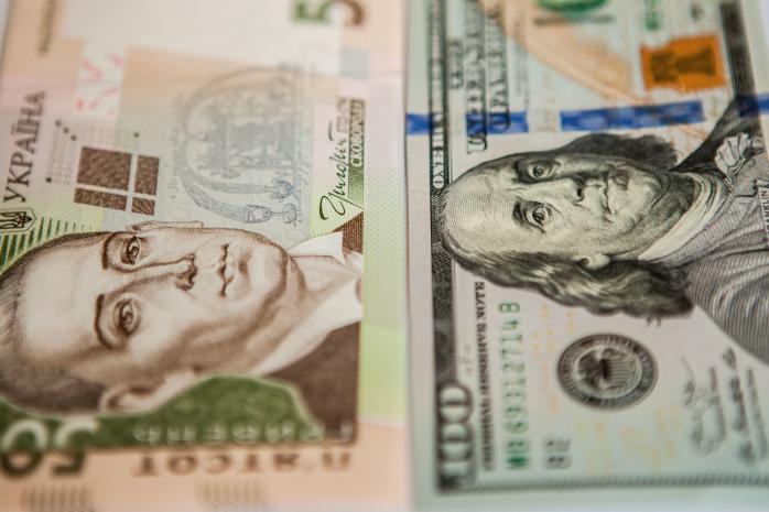 Офіційний курс гривні до валют зміцнив Нацбанк. Фото: flickr.com