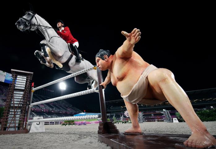 Японский спортсмен по конкуру Коки сайта на Олимпиаде. Фото: Julian Finney/Getty Images