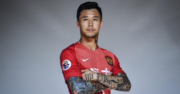 Китайському футболісту Чжану Ліньпену наказали приховувати татуювання, коли він виступає як за національну збірну, так і за клуб «Гуанчжоу», фото: Imaginechina