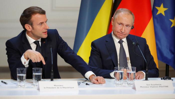 Президент Франції Еммануель Макрон та глава РФ Путін. Фото: Charles Platiau/Reuters