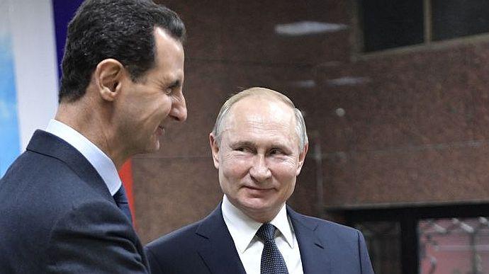 Лідер Сирії Асад та воєнний злочинець путін