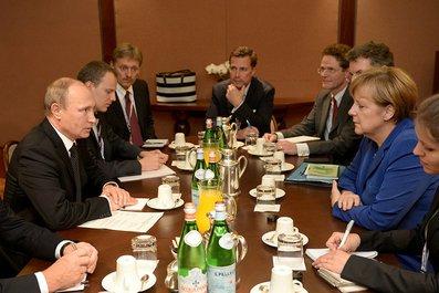 Меркель и Путин все же встретились в Милане