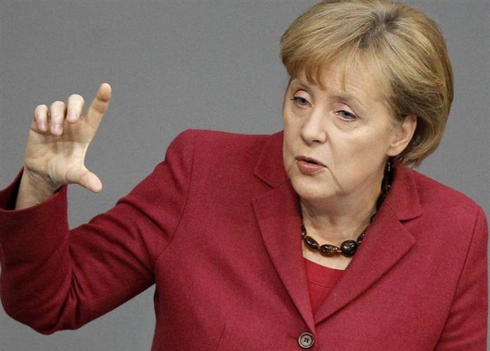 Меркель заявила, що Україна отримає контроль над кордоном вже після виборів на Донбасі